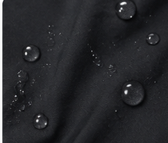 Water droplets on black quick-dry swim fabric